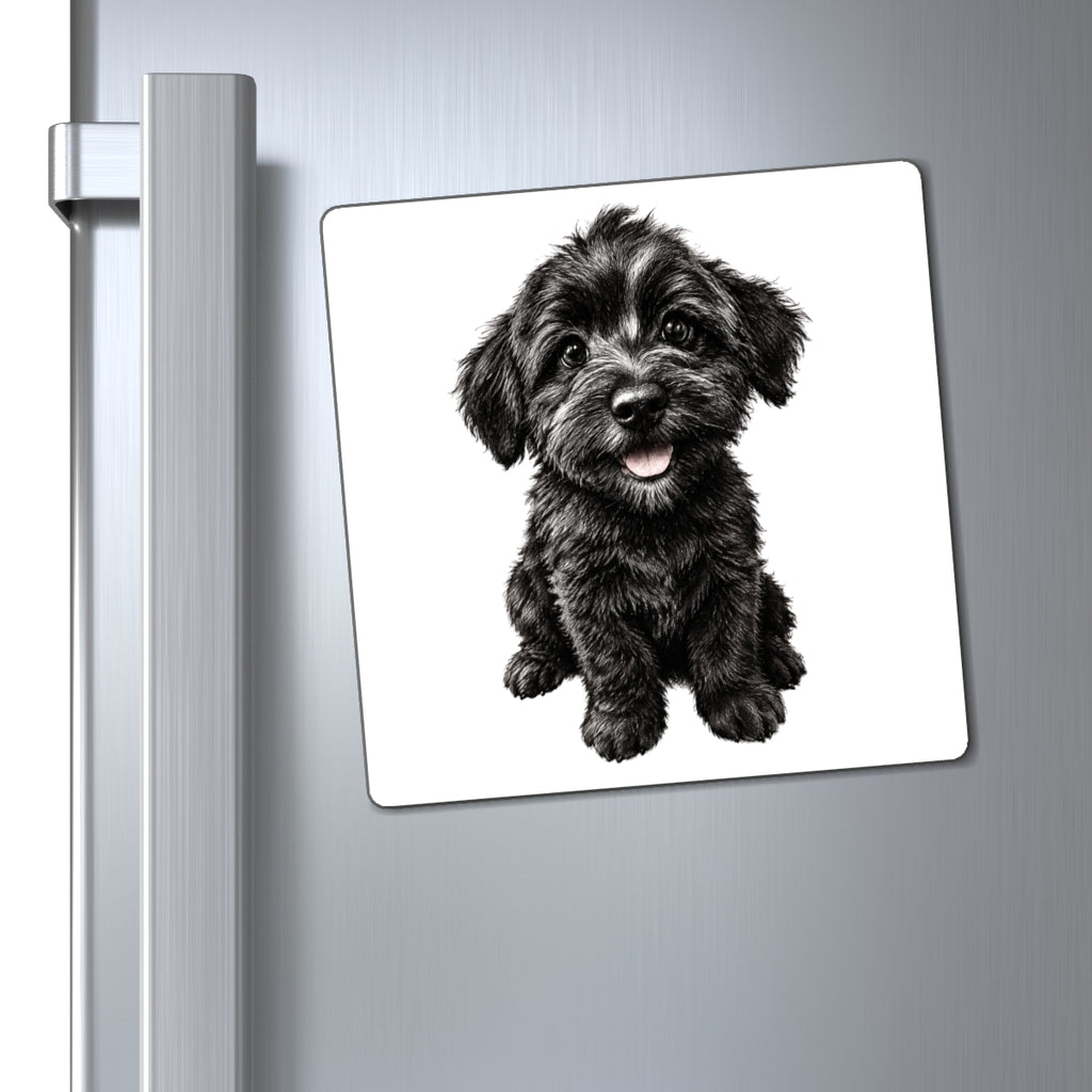 Aimant de réfrigérateur représentant un adorable chiot noir